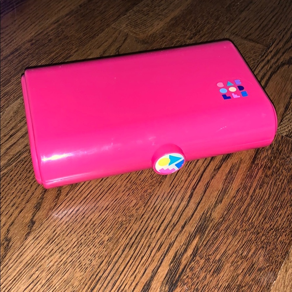 Caboodle organizer. It had a mirror and one self.